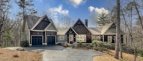 Exterior of home with plenty of parking for 5-6 vehicles 