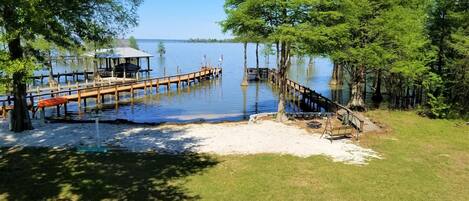 Lake front with beach, dock is one to the right