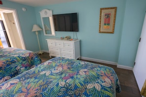 - Wake up refreshed in a bright, airy space designed for comfort & relaxation - Kick back & enjoy a movie night on the large wall mounted TV after a day in the sun - Vibrant tropical decor & plush bedding, this is your perfect home away from home