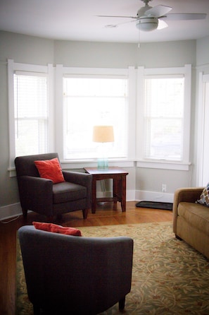 Living room looking toward the front of the house from near the kitchen. 