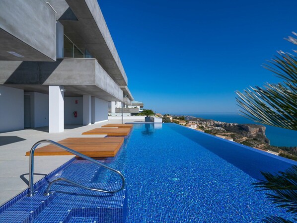 Sky, Building, Water, Blue, Azure, Swimming Pool, Shade, Leisure, Line, Condominium