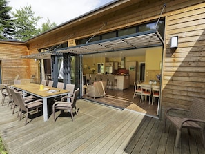 Furniture, Property, Sky, Building, Window, Table, Wood, Shade, Chair, Porch