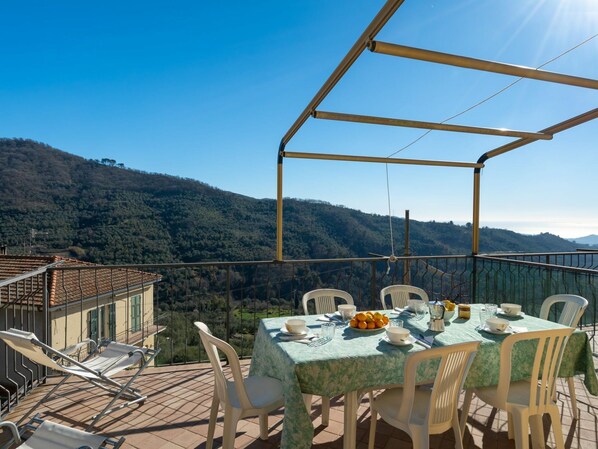 Sky, Cloud, Food, Plant, Tableware, Table, Window, Mountain, Fruit, Wood