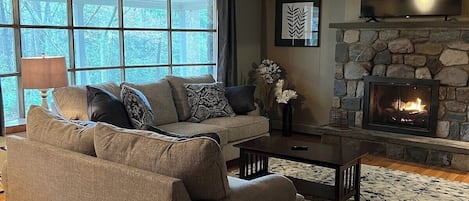 Upstairs living room.  Smart TV,  fireplace