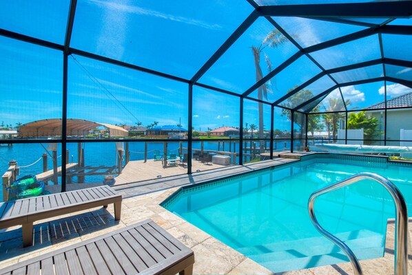 Million Dollar View... View to canal, over pool, facing due south. 