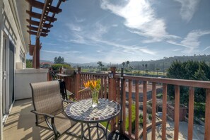 Take a seat at the table with optional umbrella for shade.