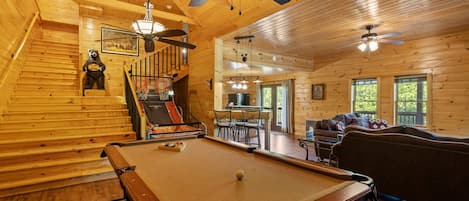 Huge game room with Pool Table, Basketball, TV, Poker Table, and 2 Arcade Cabinets!