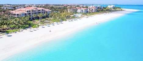 ENDLESS MILES OF WHITE SAND BEACH IN PROVIDENCIALES - VILLA RENAISSANCE PH 301-2