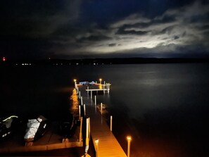 Night view of private pier from top of boat house