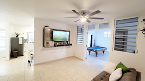 Family room space with views of entertainment & kitchen