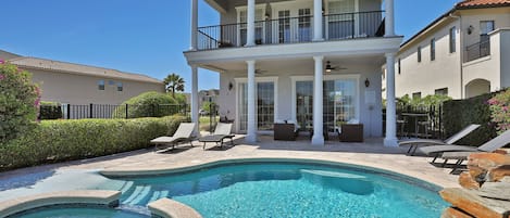 Enjoy a refreshing swim in the Florida sun or relax on one of the poolside sun loungers.