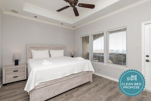 Master bedroom on the third floor with king size bed, private balcony, private bathroom and walk in closet