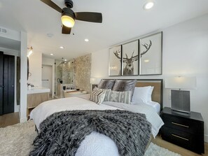 On the second level, you'll find this gorgeous second king master suite that boasts an incredible en-suite bathroom and views!