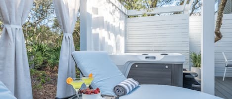 Romantic private back patio with hot tub