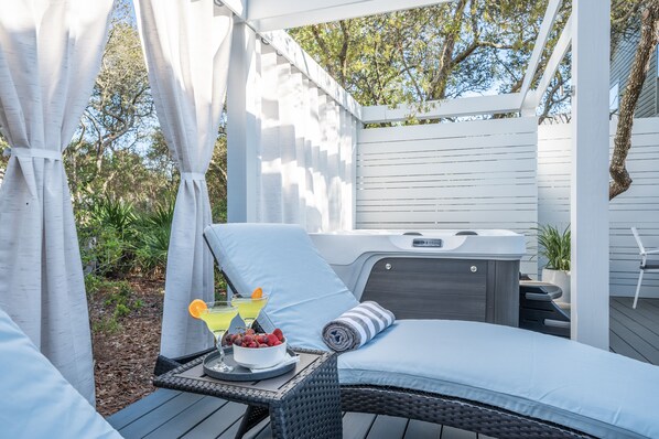 Romantic private back patio with hot tub