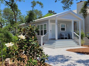 Romantic beach bungalow. Enjoy complimentary coffee on the front porch. 