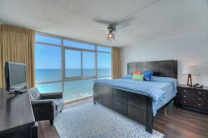 Enjoy comfort with a view in this master bedroom.