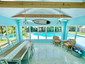 Florida room overlooking the pool area