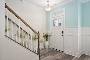 Front door entrance with coastal decor