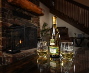 Relax and sip on wine by the fire