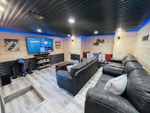 Home Theater/Game Rm with Smart TV & pullout sleeper (Karaoke not available)