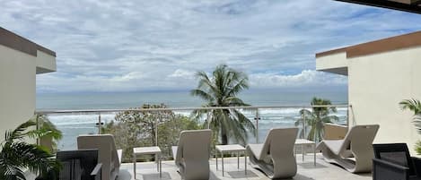 Lounge chairs at the shared rooftop terrace