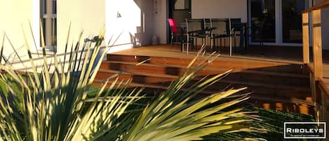 Front of the house with covered terrace under a pergola