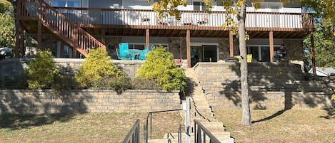 Lakeside view of our home. The deck and patio are great for relaxing!