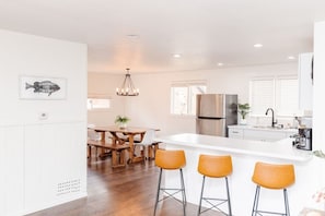 Spacious open floor plan perfect for gathering with loved ones, offering a seamless blend of comfort and style at Rowyn's Resort on Lake Nokomis.