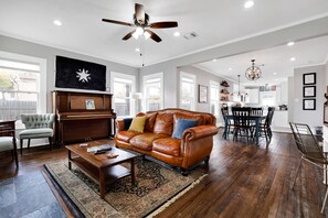 Living room, dining room, and kitchen - ready for you to settle in and enjoy a comfortable stay.  These are part of the whole house, or if guests rent only one unit, these are part of the San Antonio Suite.