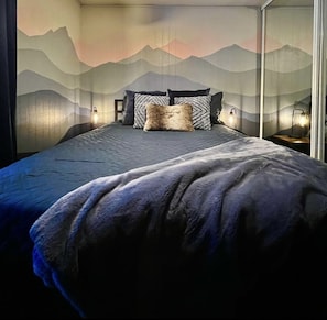 Second bedroom with private balcony deck access and it's own 55" TV