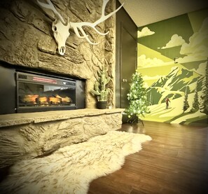 Living room fireplace
Take a picture in front of our mural 😊