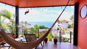 Private terrace with lounge seating and hammock to take in fantastic ocean views