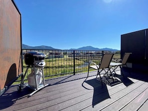 Spacious patio and grill for relaxing on summer nights.