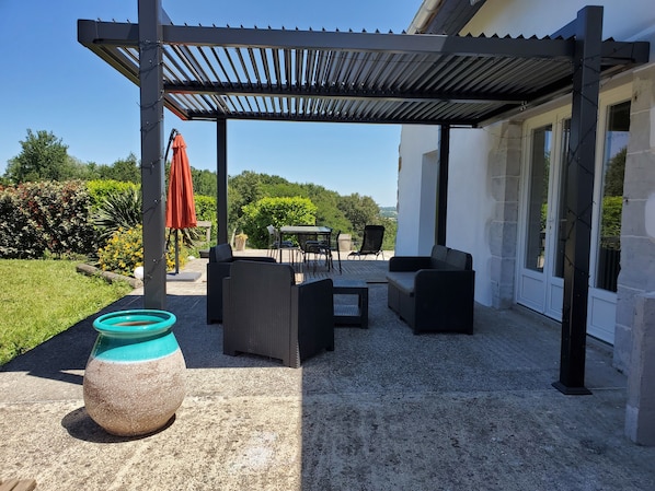 Terrasse extérieure avec pergola