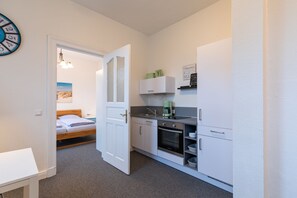 Wohnzimmer mit Küchenzeile