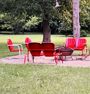 Backyard fire pit and seating for six.