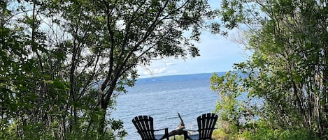 Overlooking private beach on our treed lot
