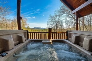 Relax in the hot tub on the upper deck with a beautiful view at the end of the day.