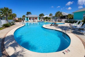 The cottage is directly across from the large, inviting pool