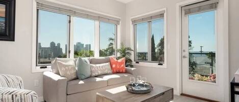 Enjoy Peak Bay & City Views From the Living Room