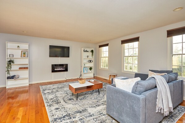 Spacious living area near the kitchen and dining room.