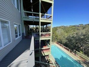 Walkway to your entrance overlooking the pool.