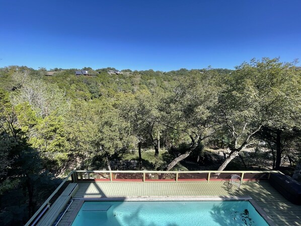 View of the valley and pool for your private deck.