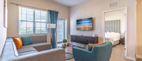 Sunlit 4th Floor Condo Main Living Area w/New Furniture and Flat Screen TV