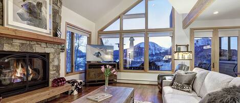 Welcoming family room with gas fireplace and gorgeous views