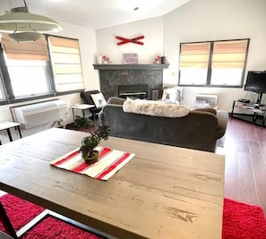 Enjoy the Fireplace over Game Night in Spacious Living Room