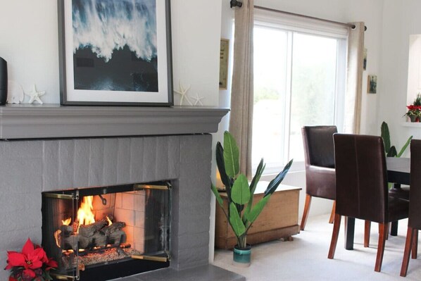 Cozy vibes around the hearth. It's all about mixing warmth with a touch of nature.