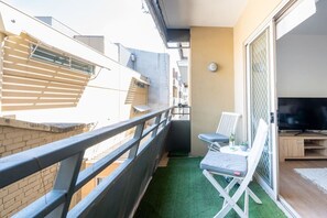 [Balcony] Adjacent balcony perfect to unwind and have a glass of wine or a cup of steaming coffee.