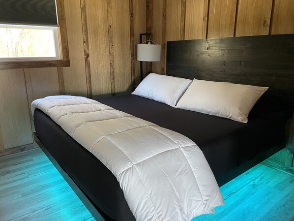 Bedroom 1 king size floating bed with LED lights